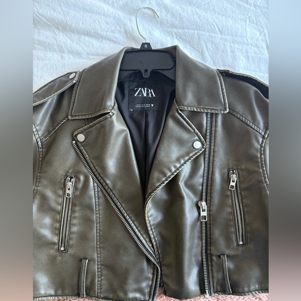 Zara faux leather biker jacket in an olive or charcoal color.